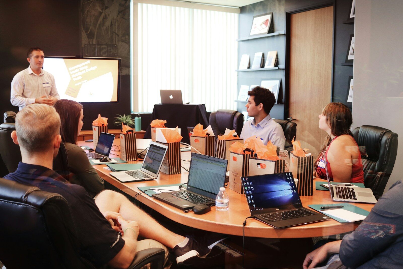 Facilitator leading a corporate leadership training session for a management team in Malaysia