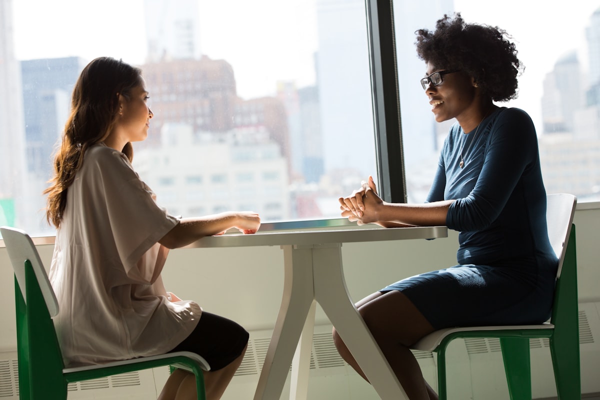 Conflict resolution training in Malaysia — two colleagues resolving a workplace disagreement