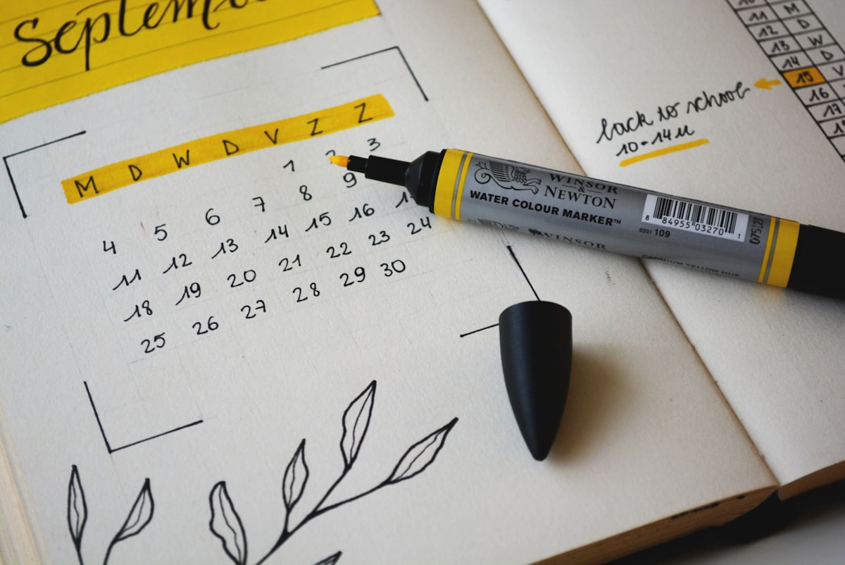 Time management training in Malaysia — planner and calendar used to schedule corporate work